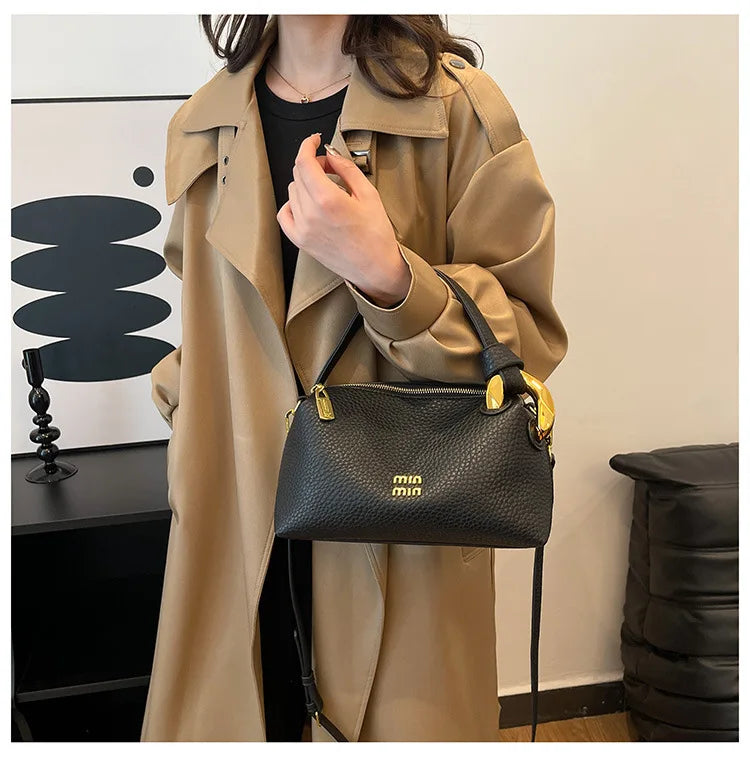 Crossbody bag, hand-held
