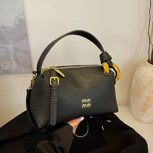 Crossbody bag, hand-held