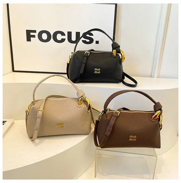 Crossbody bag, hand-held