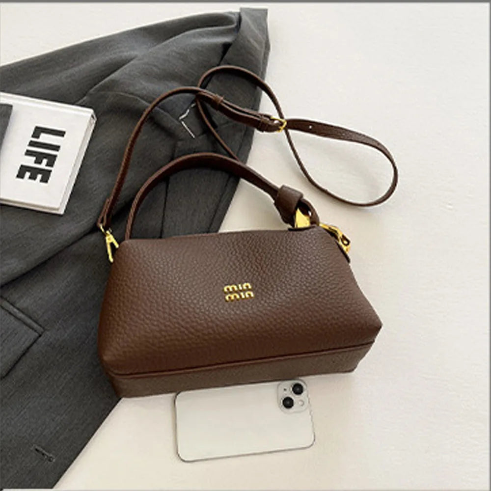 Crossbody bag, hand-held