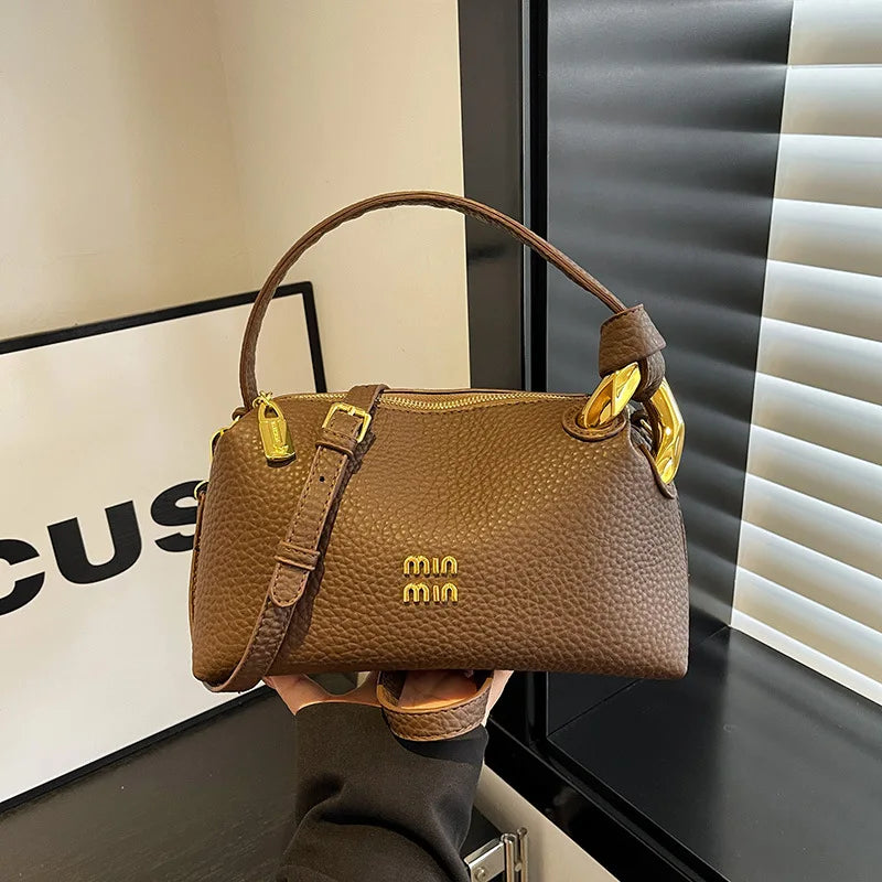 Crossbody bag, hand-held